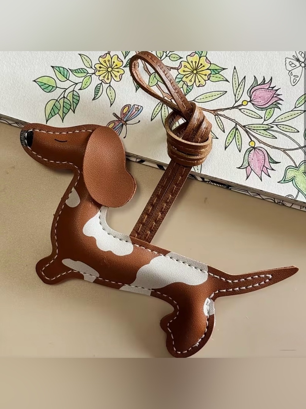 Doxie bag charm/key chain with long straps. Vegan PU leather.
